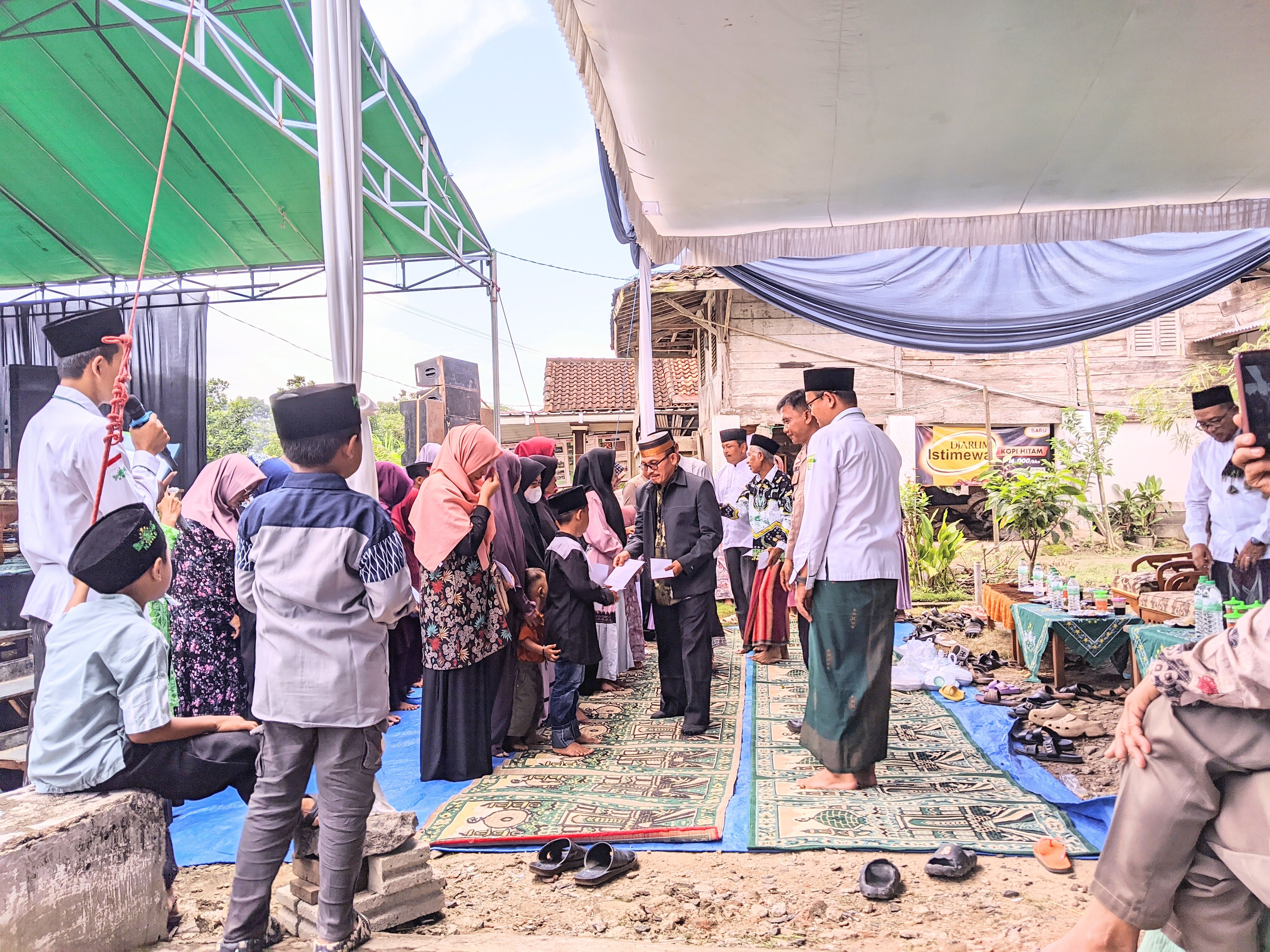KUA Metro Kibang Hadiri Muharram Berkah dan Santunan 16 Anak Yatim di Desa Sumber Agung